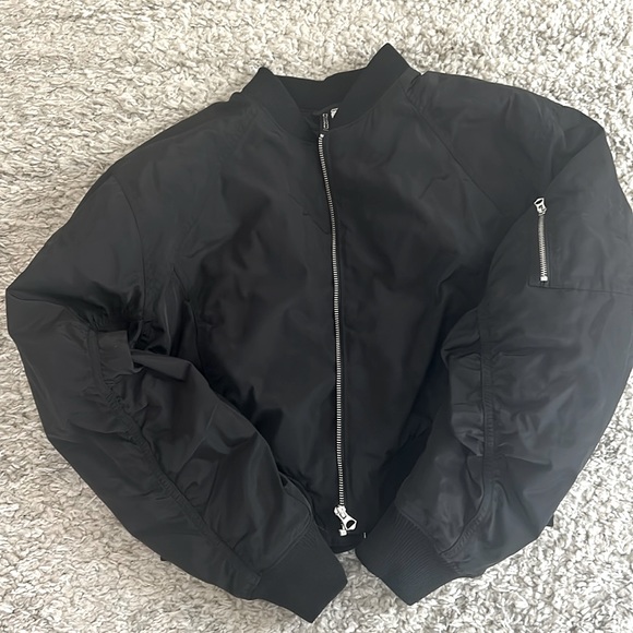 H&M Black bomber jacket. Zip up, pockets plus little zipper pocket on sleeve - Picture 1 of 3